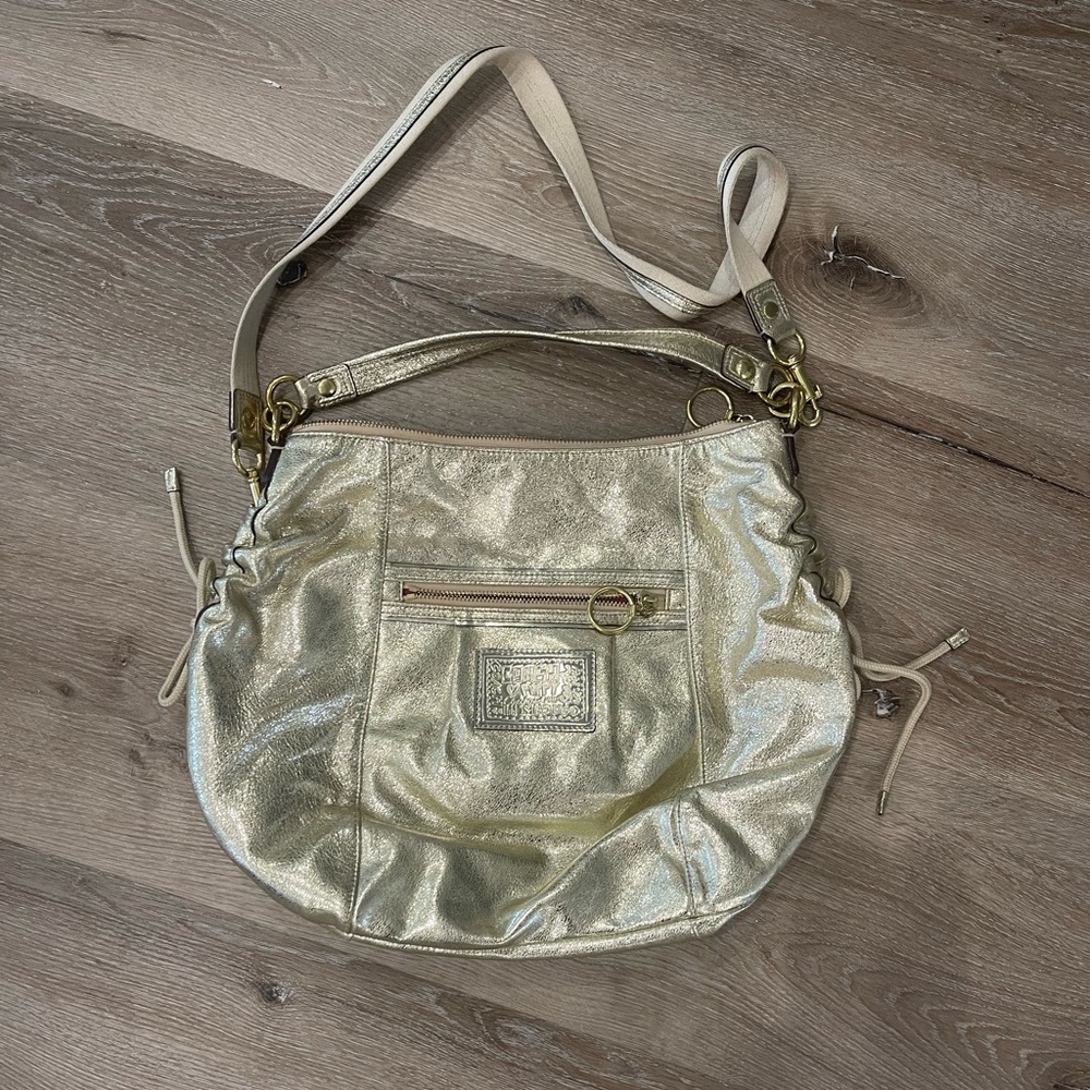 Gold coach purse